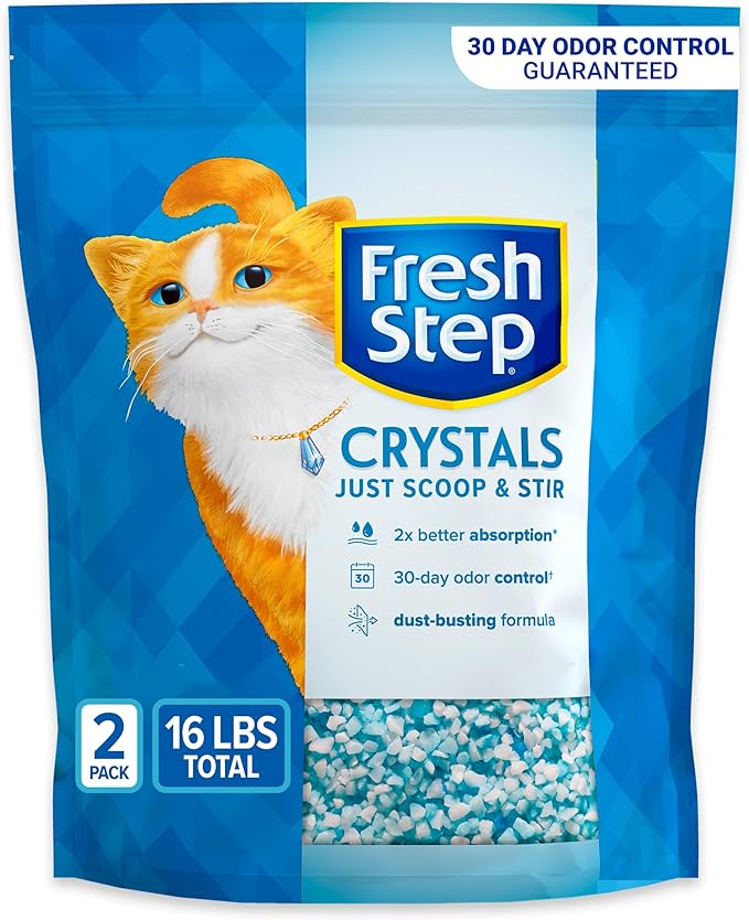 Fresh Step Crystals cat litter 16 pound package with orange tabby cat showing 30 day odor control guarantee and dust-busting formula