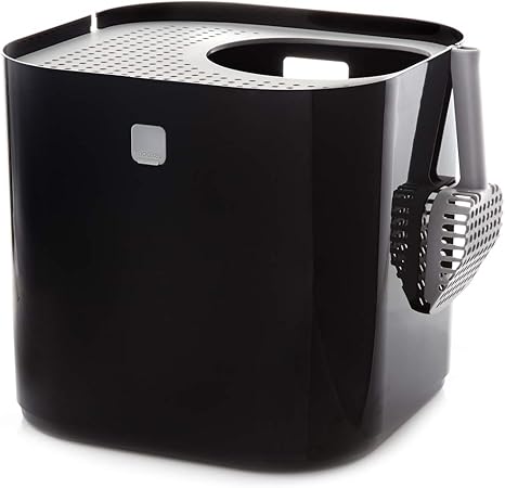 A sleek, black Modkat XL Top-Entry Litter Box is shown on a white background, with its perforated walk-off lid and a grey litter scoop hanging from a hook on its side.
